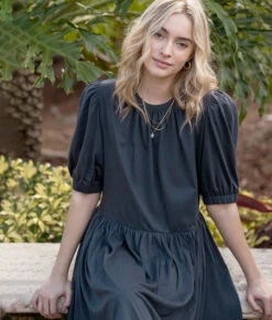 The Luxe Pima Puff-Sleeve Mini Dress - Midnight 5 The Luxe Pima Puff-Sleeve Mini Dress - Midnight -Summersalt Shop 3 ModelFullBody d32318c5 443c 4bc7 9dd3 631c2a7badac