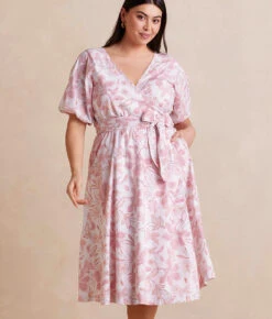 The Coastal Poplin Puff-Sleeve Wrap Midi Dress - Batik Floral In Faded Rose & White Sand -Summersalt Shop CoastalPoplinPuff SleeveWrapMidiDress BatikFloralinFadedRose WhiteSand Front Crop