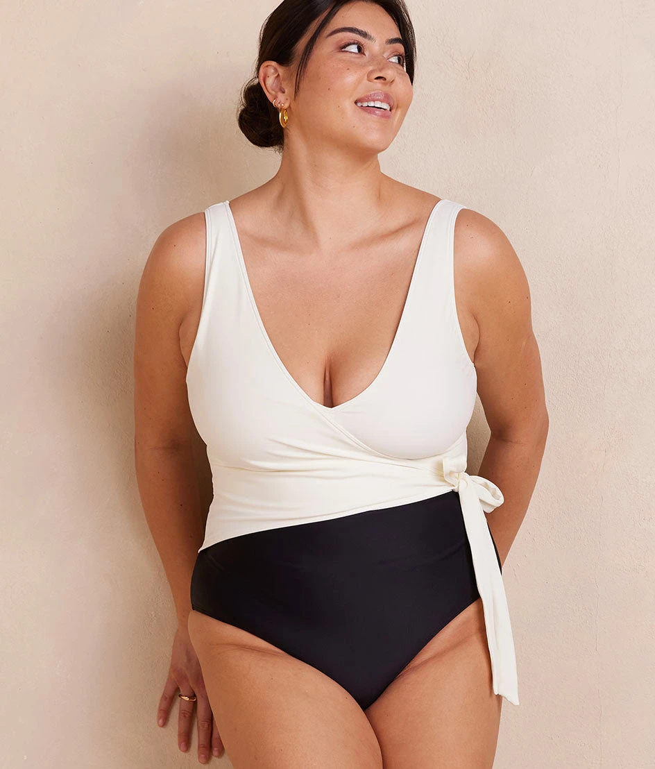 The Long Torso Perfect Wrap One Piece - Sea Urchin & White Sand The Long Torso Perfect Wrap One Piece - Sea Urchin & White Sand -Summersalt Shop PWOP SeaUrchin WhiteSand Front Crop 1f526c56 3ac3 440a a1e6 f8bc8a89be03