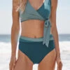 The Wrap High Leg High Rise Bikini Bottom - Seaweed & Bluestone & Mist -Summersalt Shop Wrap High Leg High Rise Stone Blue Oceanside 1 79fe29fa 95dd 4525 b3c6 f723fe815f0d