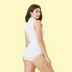 The Sleeveless Day To Night Bodysuit - White Sand -Summersalt Shop sleeveless body suit 1 1cf89e5f 9a02 4e3a af6b 3752c1d7bc5d